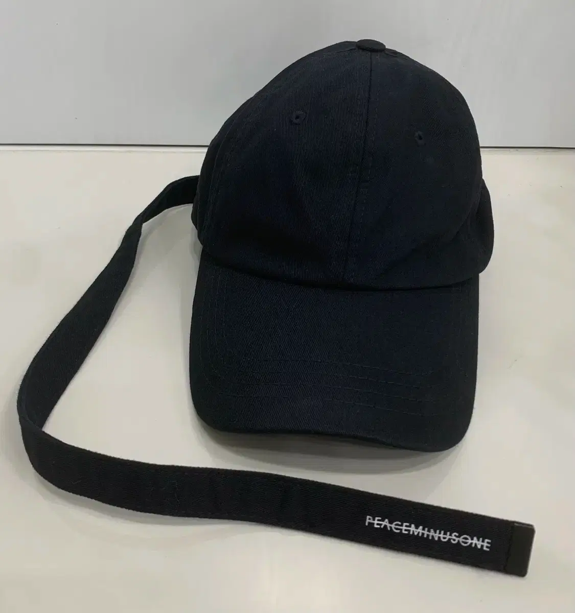 OS]피스마이너스원 초판 롱 스트랩 볼캡 블랙 모자 캡 피마원 | 브랜드